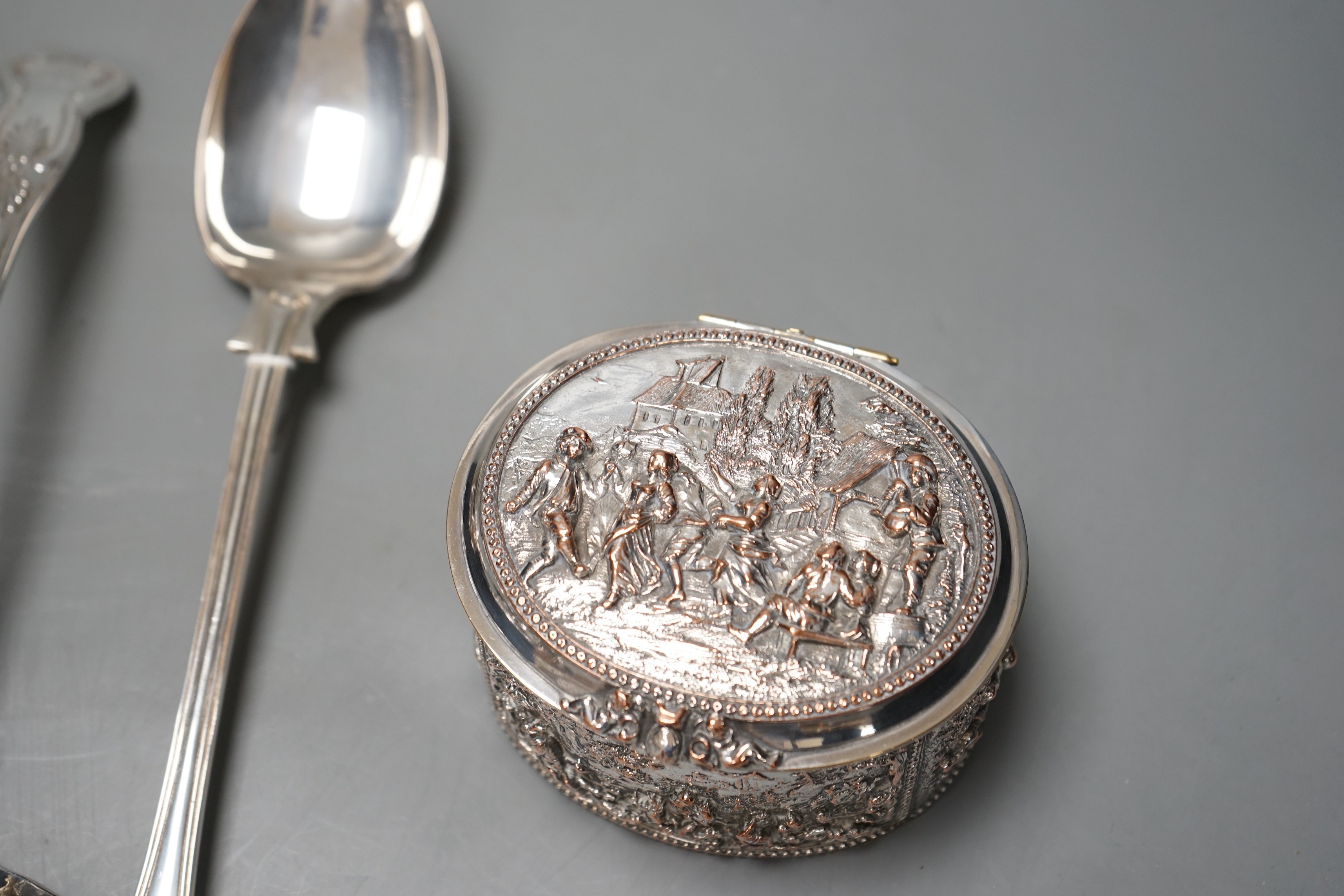 A plated dish ring, a pair of plated coasters, electrotype box, platted basting spoon and soup ladle and four spoons